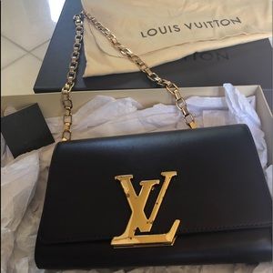 Louis Vuitton Leather Burgundy Clutch